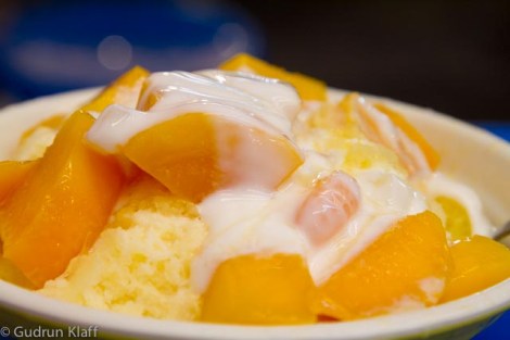 Fresh mango on ice cream with yoghurt, from the night market - mmmhmmmm